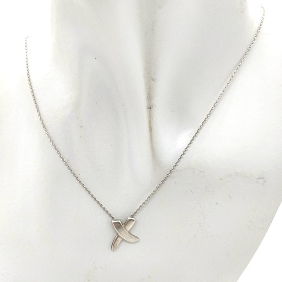 Authentic Tiffany & Co. Paloma Picasso Ribbon Cross “X” Sterling Silver Necklace